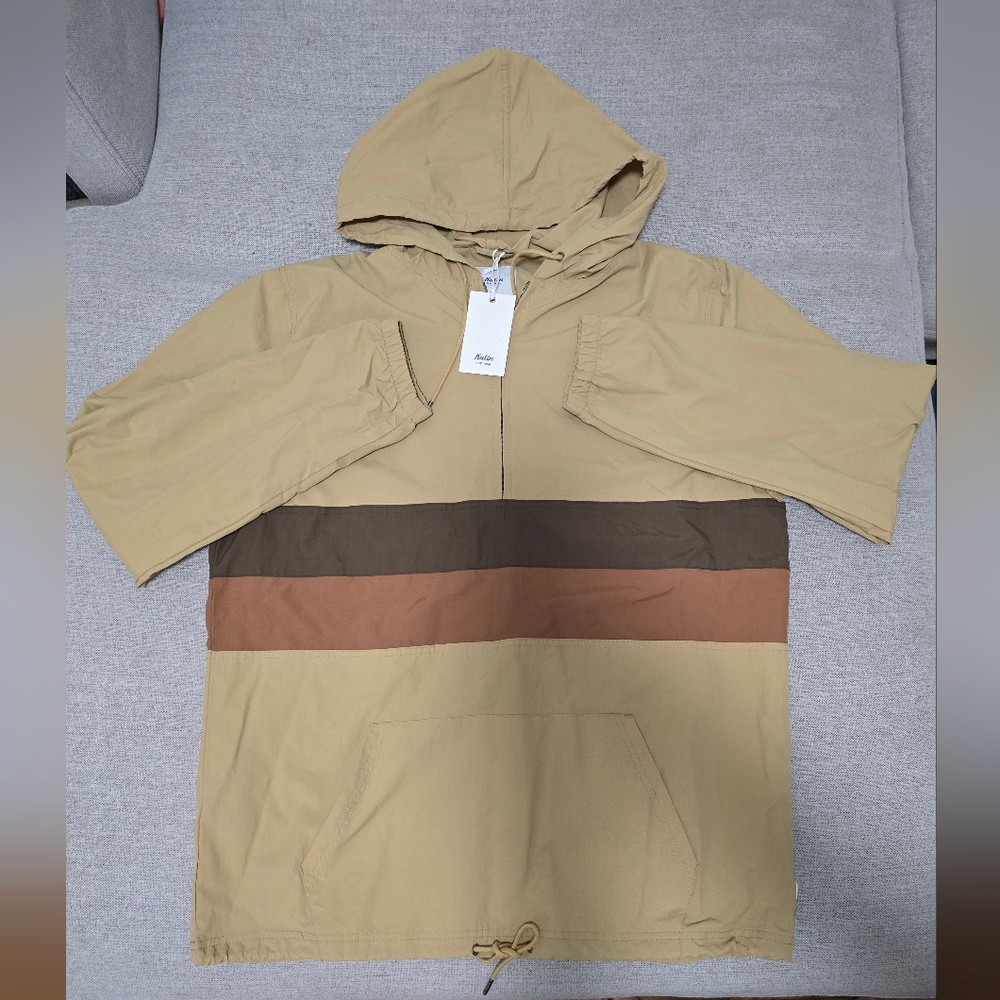 Katin khaki/color block hooded half-zip windbreaker pullover.
